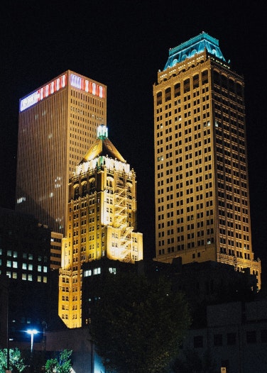A night shot of some skyscrapers in downtown Tulsa
